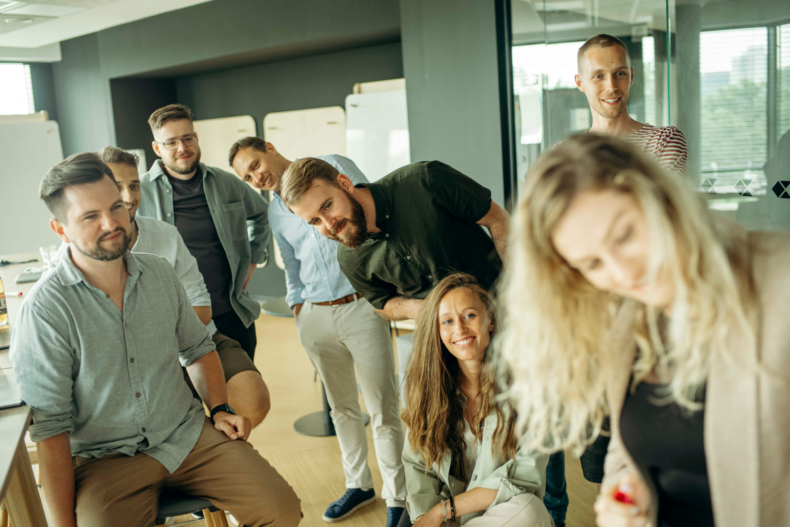 Productboard team collaborating bright office space