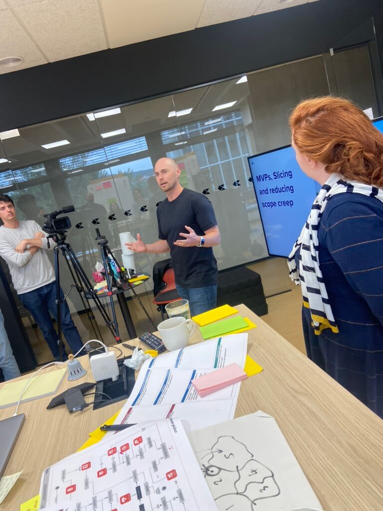 Adam Davis facilitating the 2-day learning and development bootcamp alongside AND Digital.